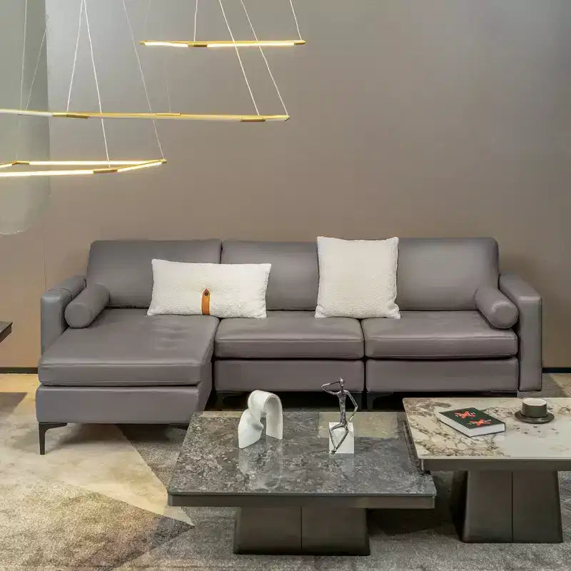 Divano componibile a L rosa corallo/grigio con penisola e porte USB, 3 posti